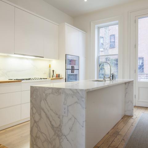 brownstone, contemporary, light, white, fireplace, kitchen, deck, 