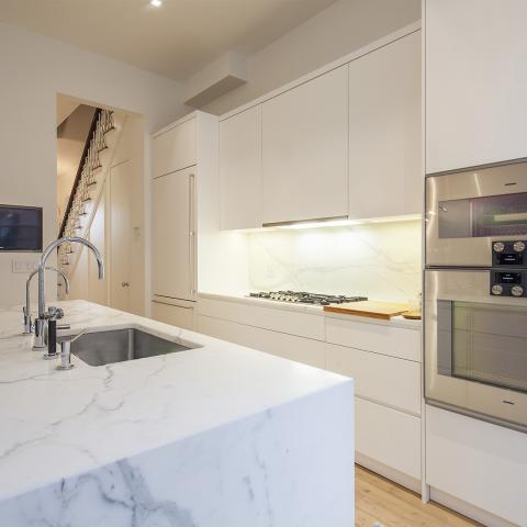 brownstone, contemporary, light, white, fireplace, kitchen, deck, 