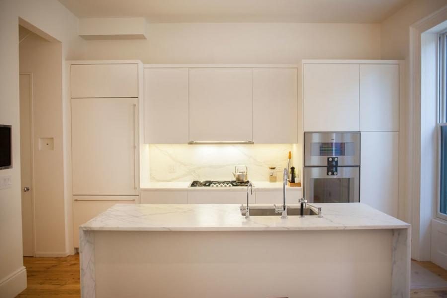 brownstone, contemporary, light, white, fireplace, kitchen, deck, 