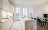 brownstone, contemporary, light, white, fireplace, kitchen, deck, 