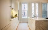 brownstone, contemporary, light, white, fireplace, kitchen, deck, 