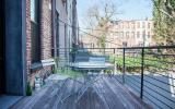 brownstone, contemporary, light, white, fireplace, kitchen, deck, 