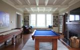 suburban, pool table, patio, staircase, fireplace, kitchen, porch, bathroom, 