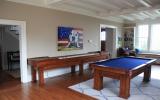 suburban, pool table, patio, staircase, fireplace, kitchen, porch, bathroom, 